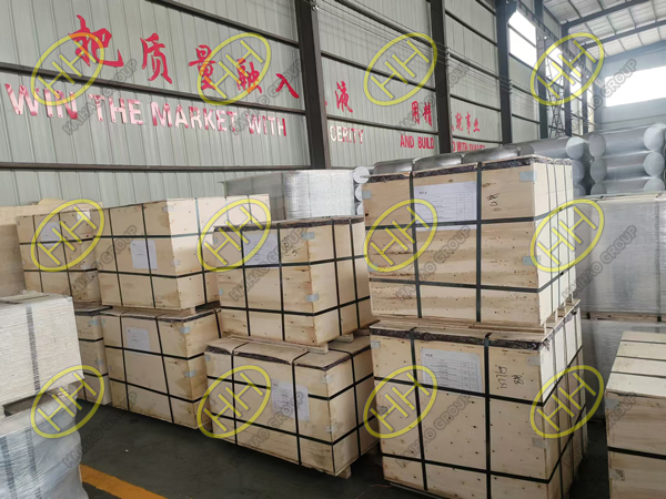 ASTM A234 WP11 90° elbows packed securely in wooden cases, ready for shipment to Spain