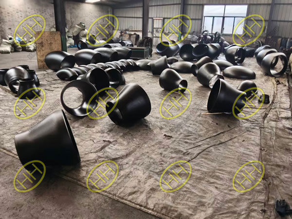 ASME B16.9 A234 WPB pipe fittings, including elbows, tees, and reducers